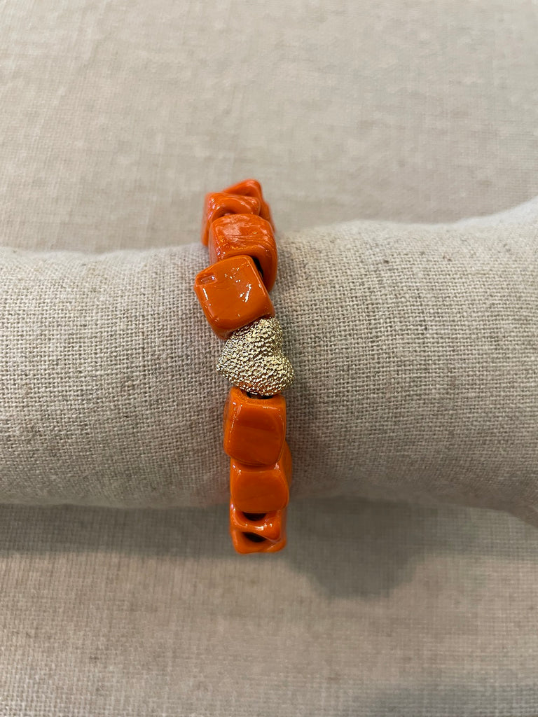Amber ceramic heart bracelet in orange and gold  @ modin